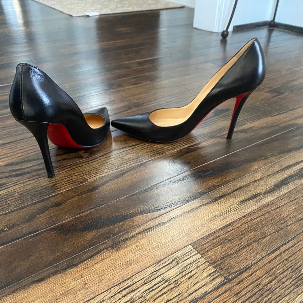 Christian Louboutin Black leather heels.